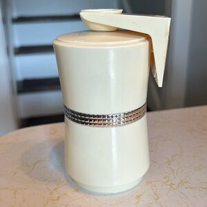 Vintage yellow atomic starburst Dixie cup holder